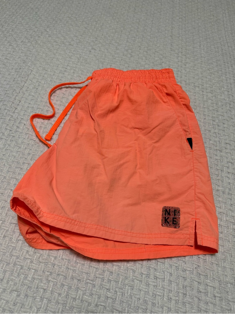 Nike lined men’s orange swim shorts Size XL.  Great condition!